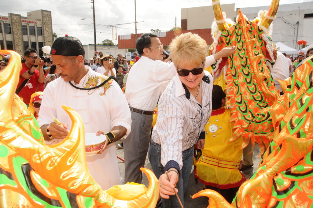 Commissioner Patty Sheehan did the eye dotting the Dragon at the Dragon Parade Lunar New Year Festival