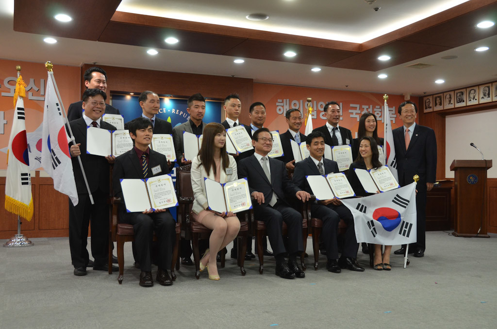 First 13 Korean adoptees receiving Dual Citizenship in Korea pose for a photo. Dual citizenship in Korea for adoptees was made possible through lobbying efforts led by adoptee activists in Korea. (Photo courtesy of G.O.A.'L.)