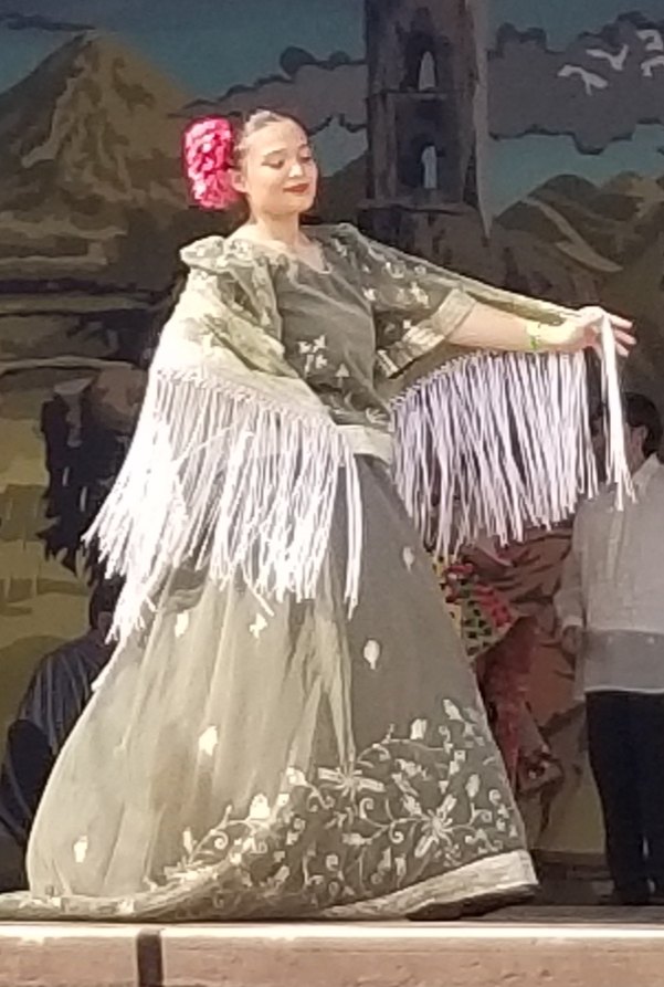Model and dancer Natasia Milyo modeling a Philippine Spanish inspired gown at the Philippine Fashion Show at PhilFest 2022