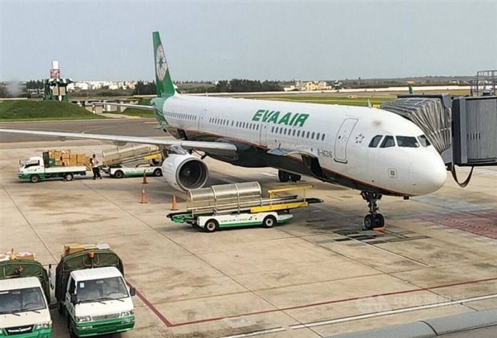 An EVA Air plane is parked in the Taoyuan Airport