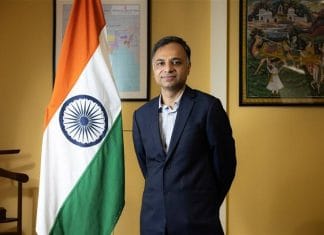 INTERVIEW/New envoy eyes closer India-Taiwan ties based on complementary strengths India's representative to Taiwan Manharsinh Laxmanbhai Yadav poses for a picture alongside the Indian national flag in Taipei on October 2