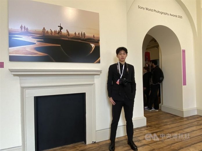 Daniel Dian-ji Wu pose in front of the photo which won him the Youth Photographer of the Year recognition at the 2025 Sony World Photography Awards in London. CNA photo April 16, 2025 Daniel Dian-ji Wu