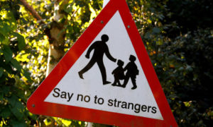 Sign saying 'Say no to strangers'
