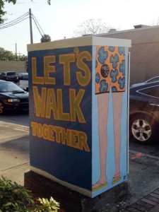 Paying homage to the Mills 50 mission of creating a more walkable community. Painted by Bethany Taylor Myers.