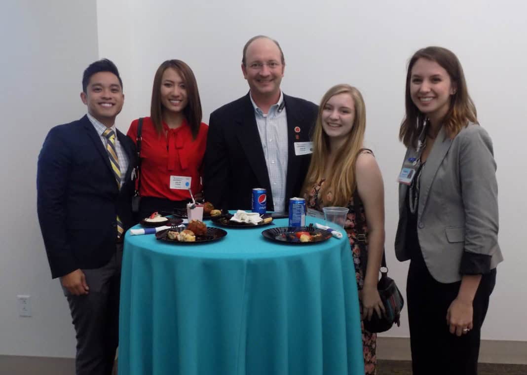 Nemours Children&rsquo;s Hospital representative greets AACC members Don Nguyen, June Wong, Ken Pierce, Cassidy Pierce