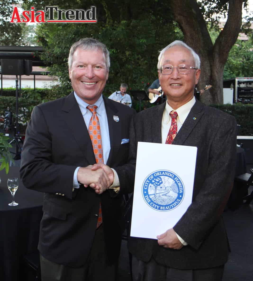 City of Orlando Mayor Buddy Dyer and C.T. Hsu