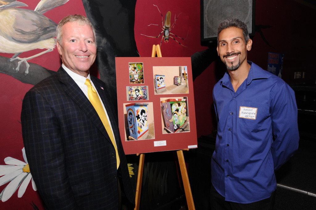 Orlando City Mayor Buddy Dyer and local artist Danny Rodriguez at Mills 50 Celebration of Art, honoring artists who participated in the public art project.